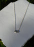 Penjoll Ull Protector de plata 925 sobre fons blanc artesanal