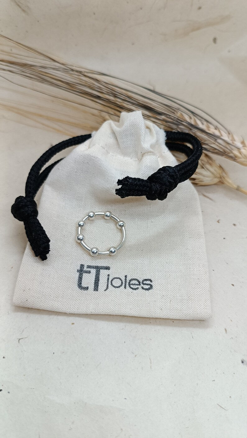 Anell Antiestrès de Plata amb 7 Boletes Giratòries – detall de les boletes